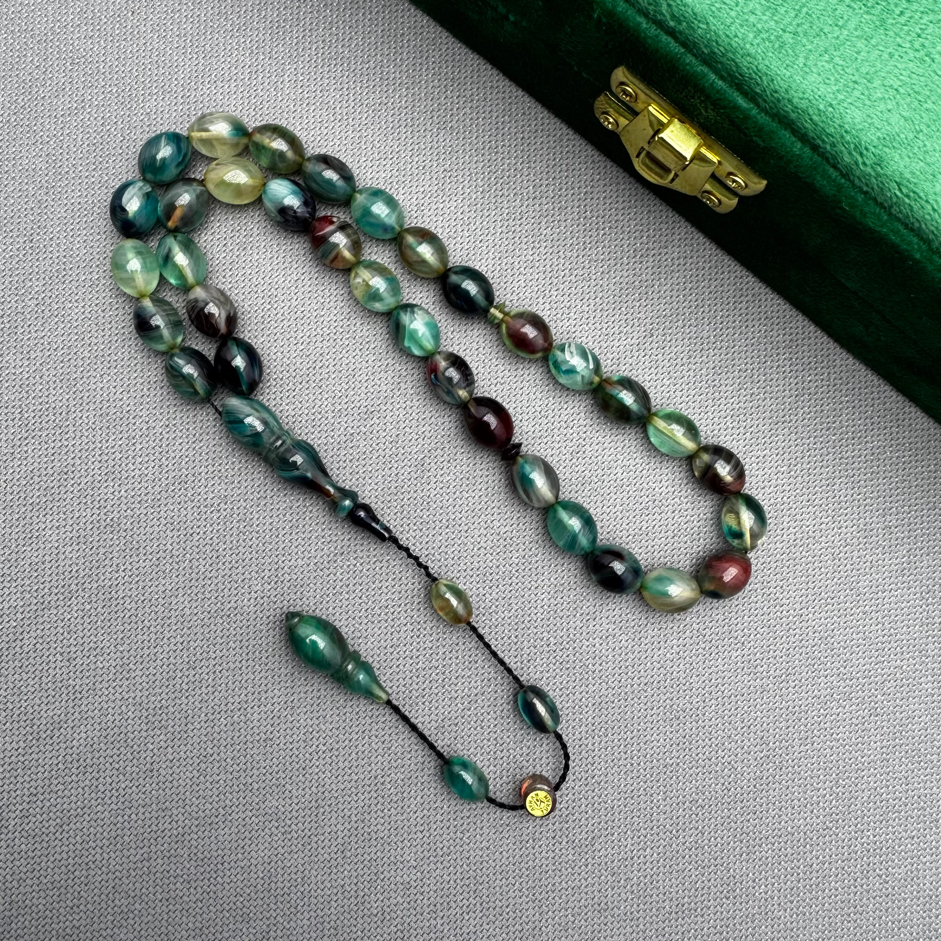 Ayhan TURAN Usta İşçilikli Hareli Renk Süzmeli Beyzi Kesim Ateş Kehribar Tespih